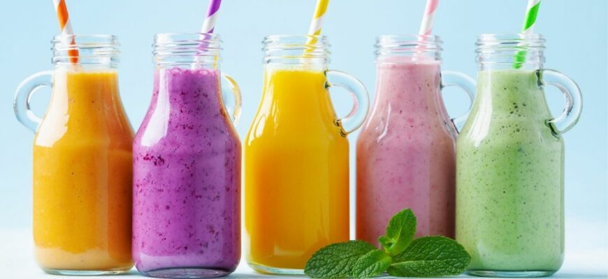 healthy colorful smoothies on jars