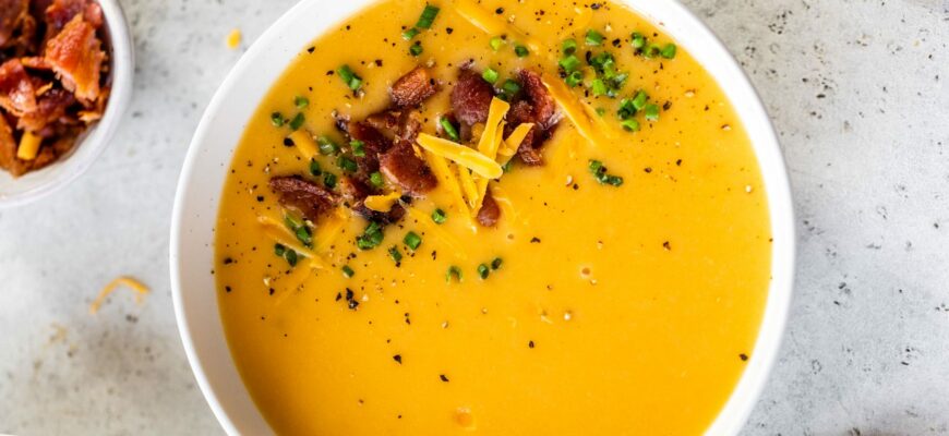 rich and creamy cheddar cheese soup made with carrots potatos and jalapeno for a spicy kick e1677593974564